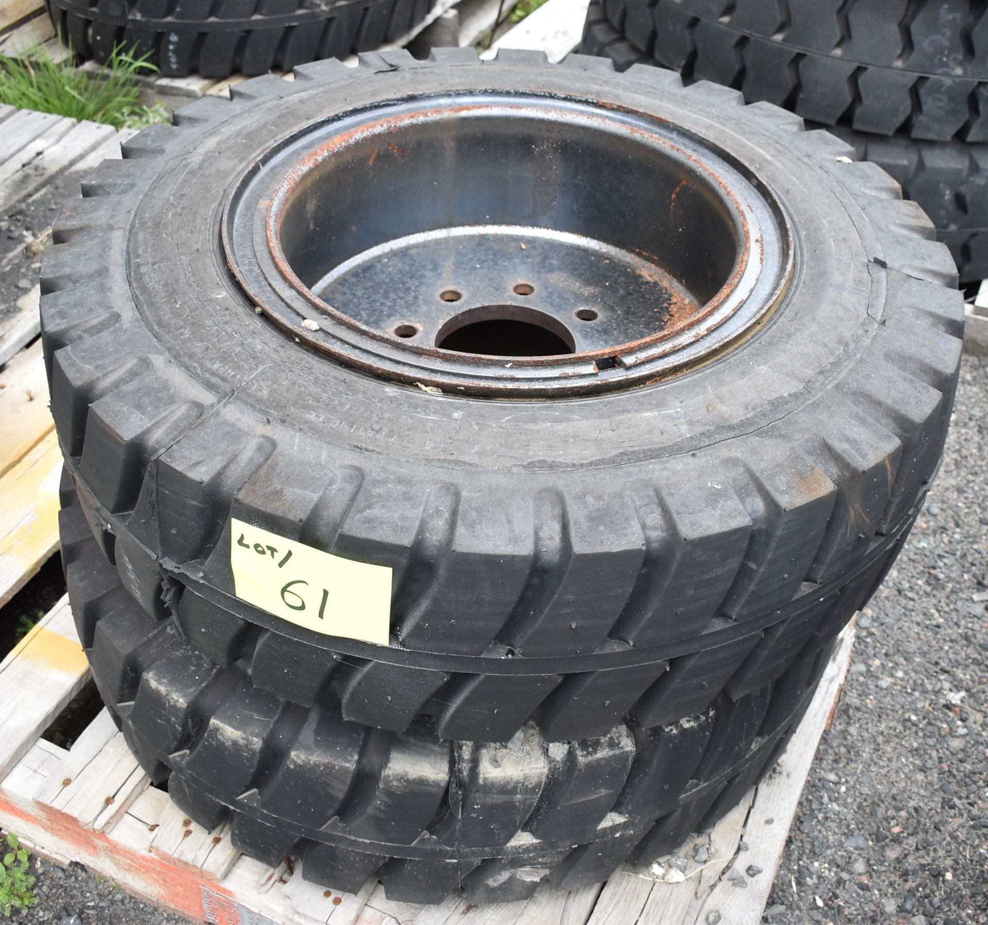 SET OF (2) HEAVY MACHINERY TIRES WITH RIMS