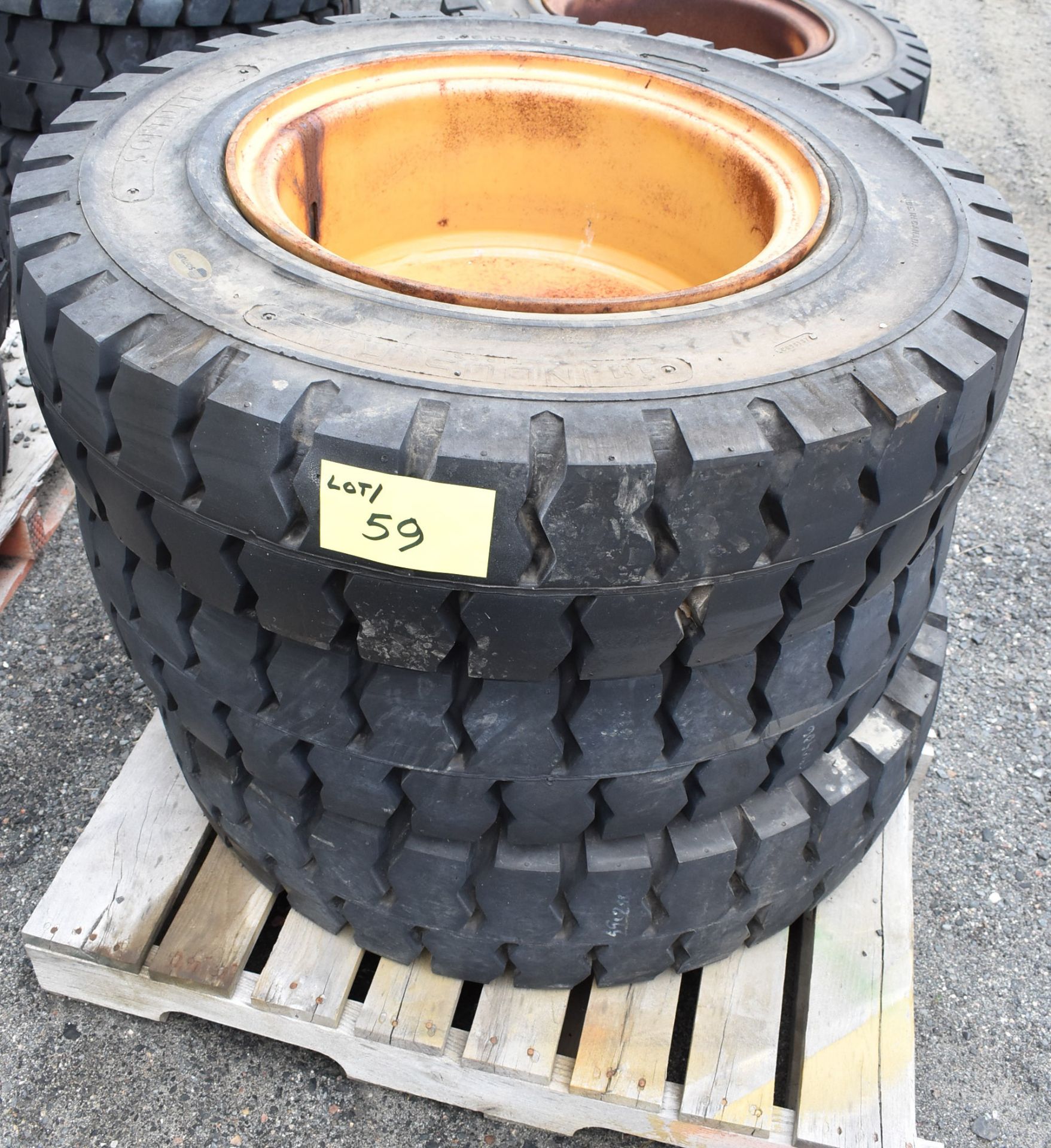 SET OF (3) HEAVY MACHINERY TIRES WITH RIMS
