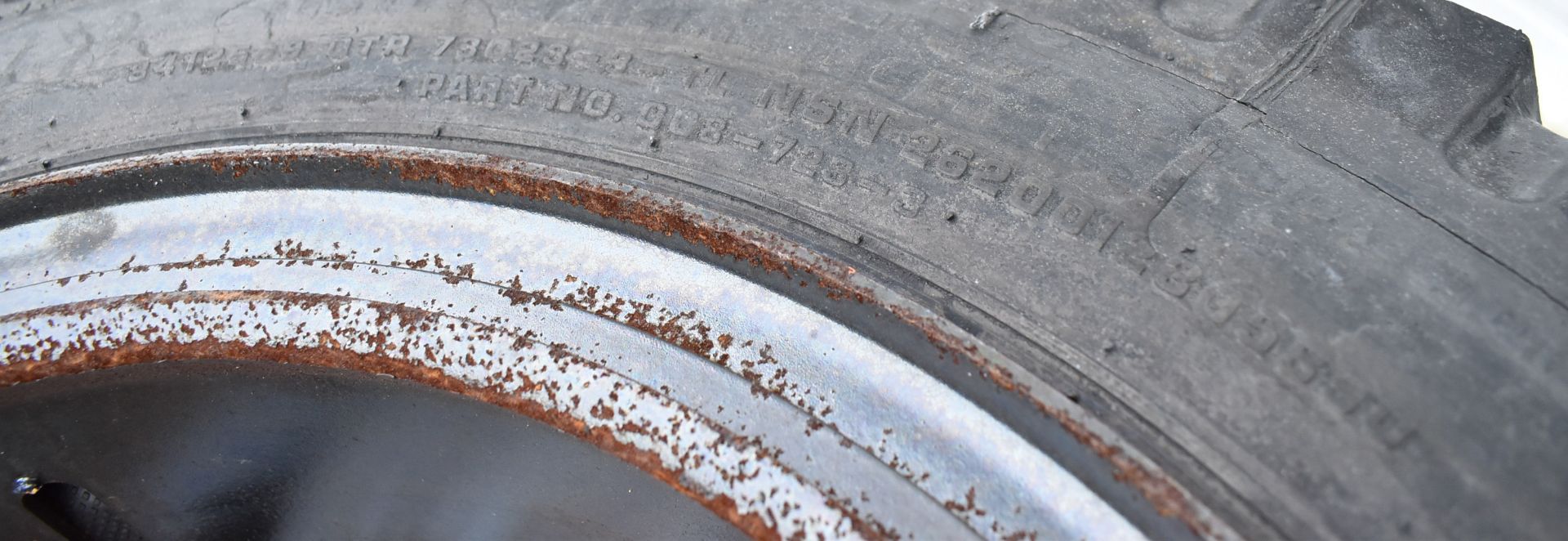 SET OF (4) HEAVY MACHINERY TIRES WITH RIMS - Image 2 of 2