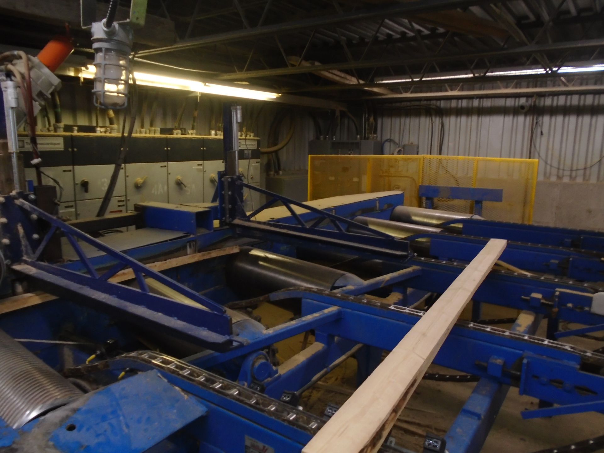 CUSTOM LUMBER INFEED SYSTEM CONSISTING OF (1) 32'L X 10'W 4 CHAIN POWERED INFEED CONVEYOR, (1) 2