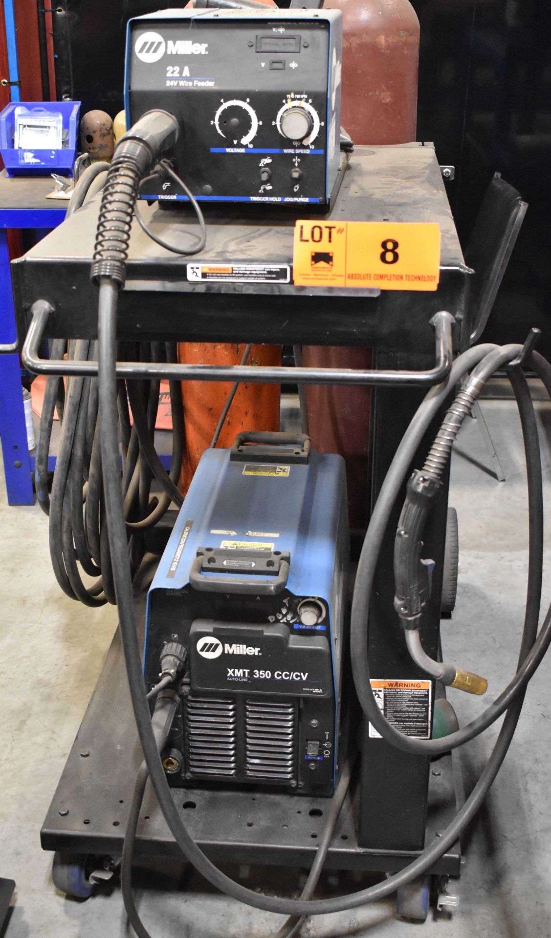 MILLER XMT 350 MIG WELDER WITH MILLER 22A WIRE FEEDER, CABLES & GUN, S/N: N/A [RIGGING FEES FOR