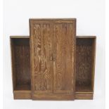 Early 20th century oak Art Deco style bookcase, two central panelled doors flanked by open