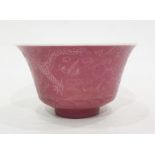 Chinese porcelain tea bowl with slightly everted rim, pink glaze and incised decoration of