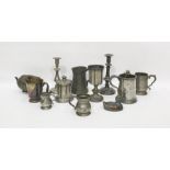 Assorted pewter items to include goblet, mug, candlesticks, etc