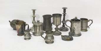 Assorted pewter items to include goblet, mug, candlesticks, etc