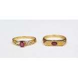 Two 18ct gold and ruby rings set single stone in pierced setting (2)  Condition ReportThe weight