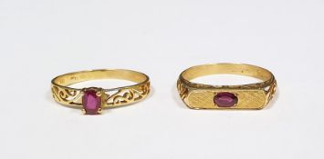 Two 18ct gold and ruby rings set single stone in pierced setting (2)  Condition ReportThe weight