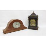 Bird's eye maple Napoleon hat shaped mantel clock, with Roman numerals to the oval dial marked 'La