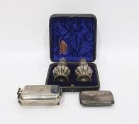 Silver cigarette case and a pair of cased sugar sifters, etc (4)