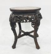Anglo-Indian table with pink marble inset top set in wooden frame with beaded edge, carved base to