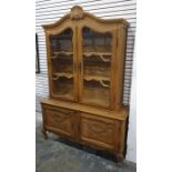 20th century oak cabinet in the French Louis XV taste, the pediment surmounted by shelf motif