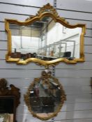 18th century style mirror in carved gilt frame, 72cm x 89cm together with a circular framed mirror