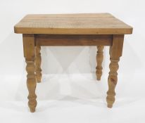 Rectangular pine table on four turned supports, the top 91cm x 74cm