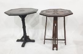 Stained oak octagonal centre table, the carved top on a single carved pedestal to quatrefoil base