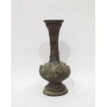 Japanese bronze vase of footed ball and shaft shape, all embossed with birds in relief, on