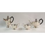 George V silver four-piece tea service to include teapot, hot water pot, cream jug and sugar