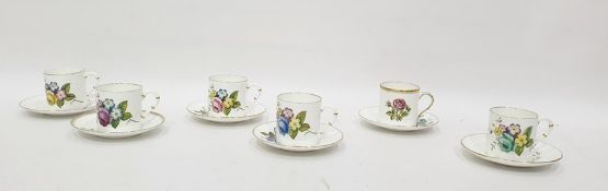 Set of six Royal Worcester china coffee cans and saucers, individually floral decorated