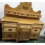 19th century pine mirror-back dresser, with oval mirror back above three drawers, the breakfront