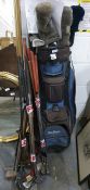 Golf caddy and assorted golf clubs