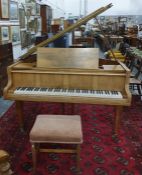 Walnut cased baby grand piano by Welmar