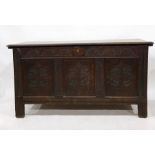 18th century oak coffer with three end carved panels to the front, on stile supports, 150.5cm x 80cm