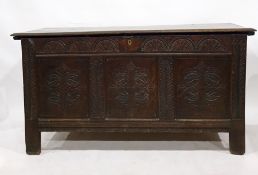 18th century oak coffer with three end carved panels to the front, on stile supports, 150.5cm x 80cm