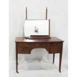 Late 19th century mahogany dressing table, mirror above four assorted drawers on a slight bow on