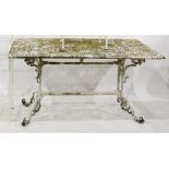 White painted cast metal garden table