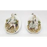 Pair (probably French) relief porcelain portrait plaques in the manner of Jacob Petit,