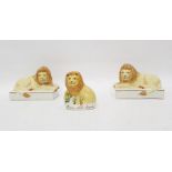 Pair of Staffordshire flatback lions and a further Staffordshire flatback model of lion, titled '