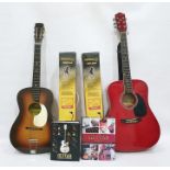 Earthfire summer breeze GA 1000 RD acoustic guitar together with a Varsity acoustic guitar and two