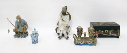 Two Japanese earthenware and partly glazed figures of men, lacquer musical jewellery box, Japanese