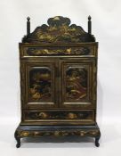 Japanese lacquer table cabinet having shaped gallery painted with volcano in landscape, one long