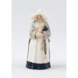 Royal Worcester porcelain candle extinguisher in the form of a nun