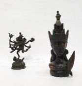 Antique Indian bronze model of Shiva with eight arms and standing on a baby on domed circular