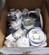 Sutherland China part tea service the cream ground painted flower decoration with blue rims and