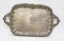 19th century silver plated two handled tray, rounded oblong, the centre allover chased and having