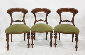 Set of four mahogany 19th century dining chairs with serpentine fronted seats, turned and carved