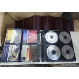 Large quantity of CD's within faux leather folders ( 5)
