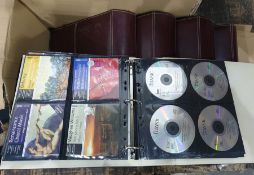 Large quantity of CD's within faux leather folders ( 5)