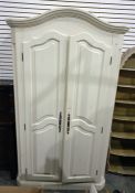 Modern cream painted two door wardrobe raised on plinth base, 118 x 206cm