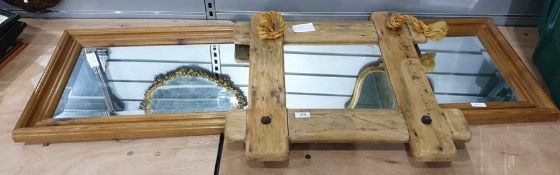 Square mirror in rustic frame with rope knot hanging and a dressing/wall mirror within a pine