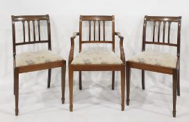 Set of six reproduction mahogany dining chairs including two carvers on square sectioned tapering