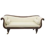 William IV mahogany sofa, cream fabric upholstery, elegantly dipping back rail on scroll arms,