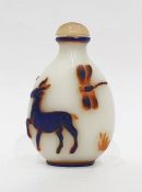 White ground snuff bottle decorated with hare, radish, deer and dragonfly