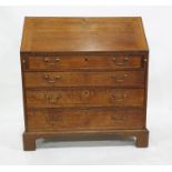 19th century oak bureau, the fall front opening to reveal assorted drawers, and secret drawers above