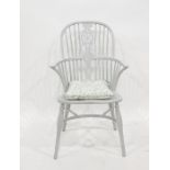 Painted Windsor chair with wheel back splat, dished seat, crinoline stretcher, turned supports