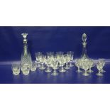Two various cut glass decanters and a quantity of sundry cut drinking glasses