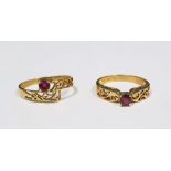 Two 18ct gold and ruby rings, each set single stone in pierced setting (2)  Condition ReportThe