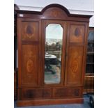 Late 19th/early 20th century mahogany inlaid wardrobe, the dome top with ogee moulded pediment,